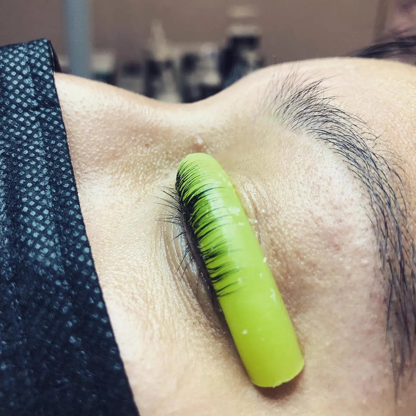 Lashes set on a silicone rod during a lift