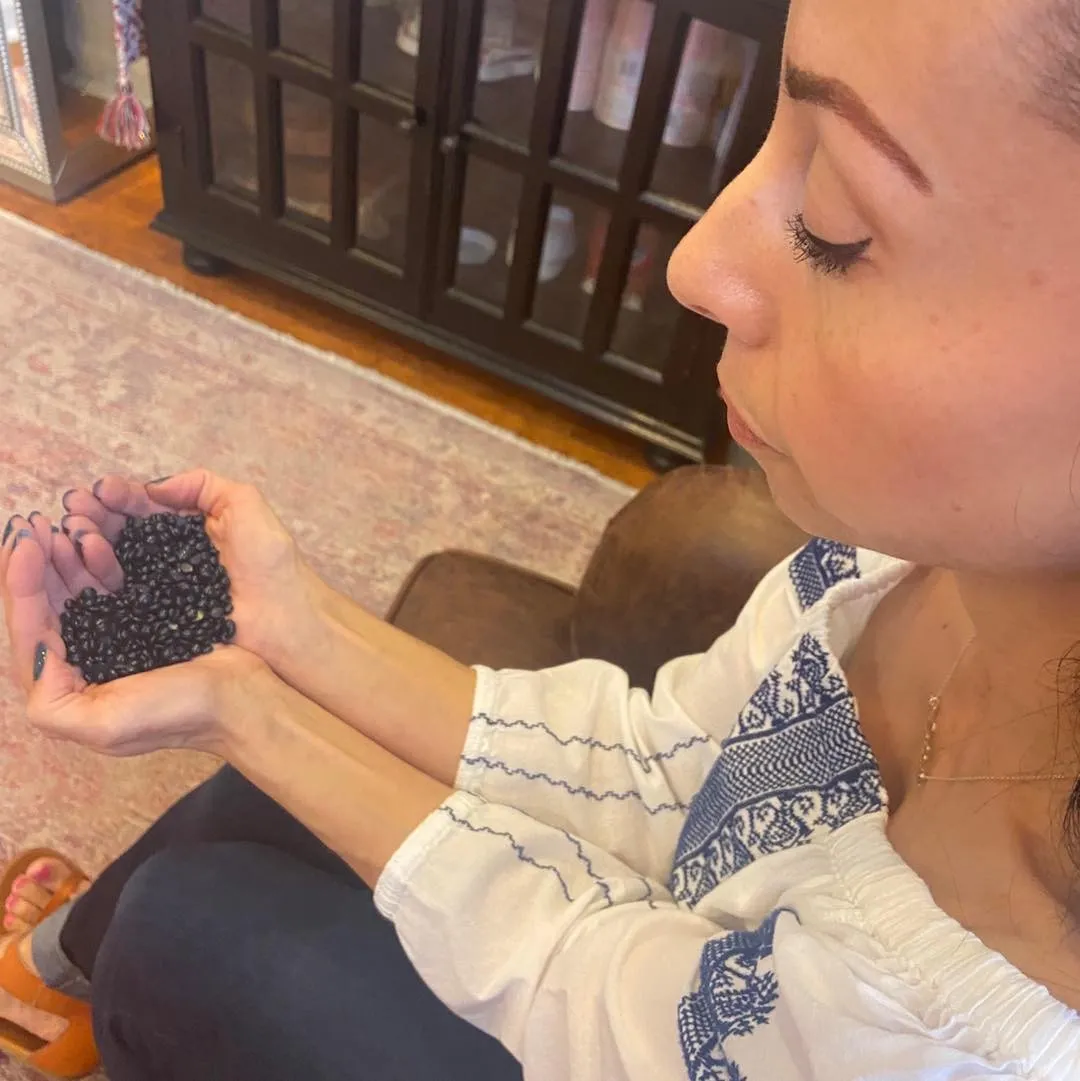 Nella waxing a client's brow